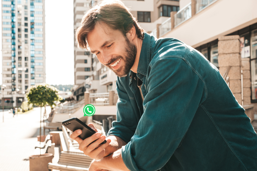 holding phone while on whatsapp.png